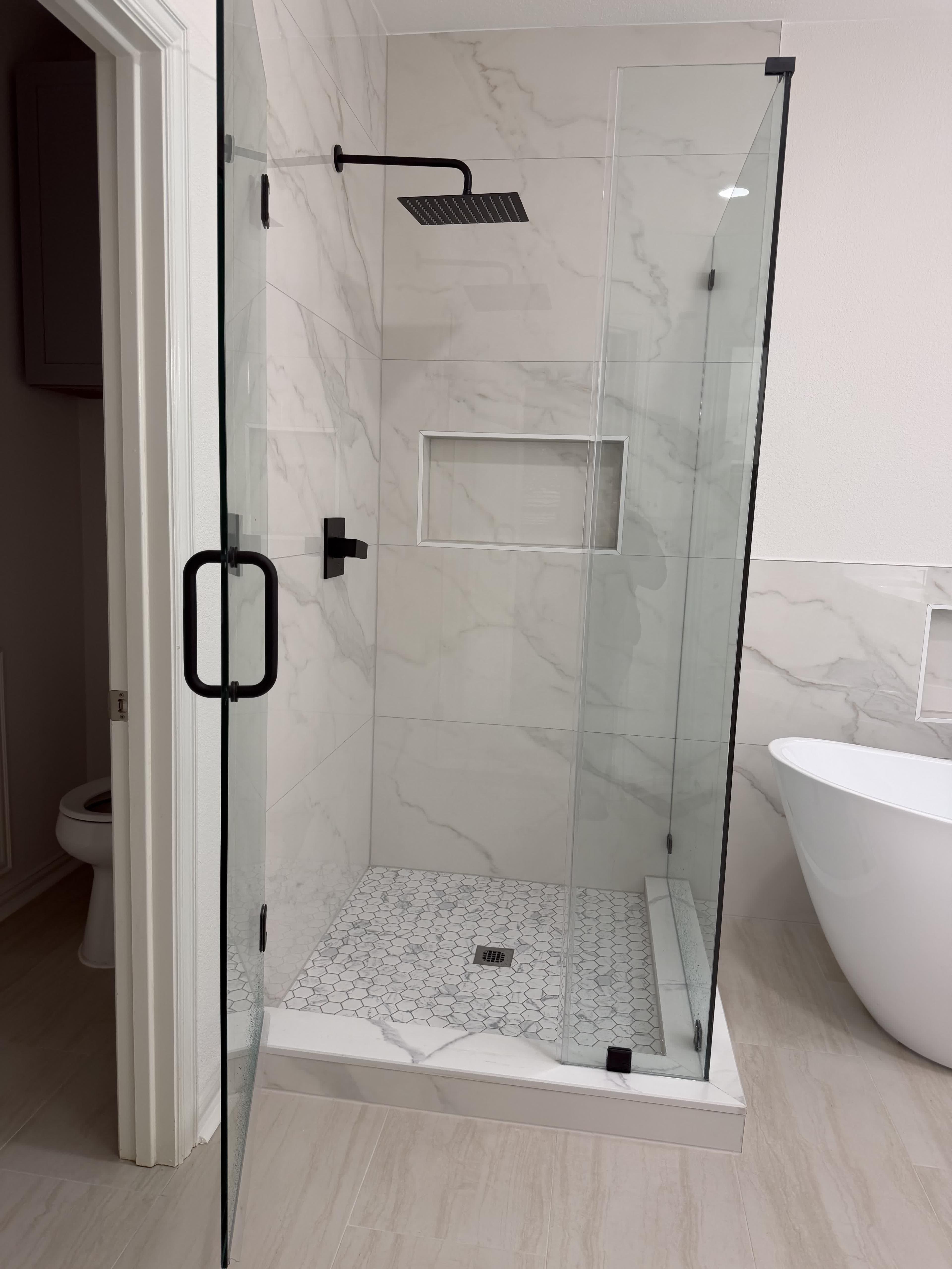 Walk-in shower with hex floor